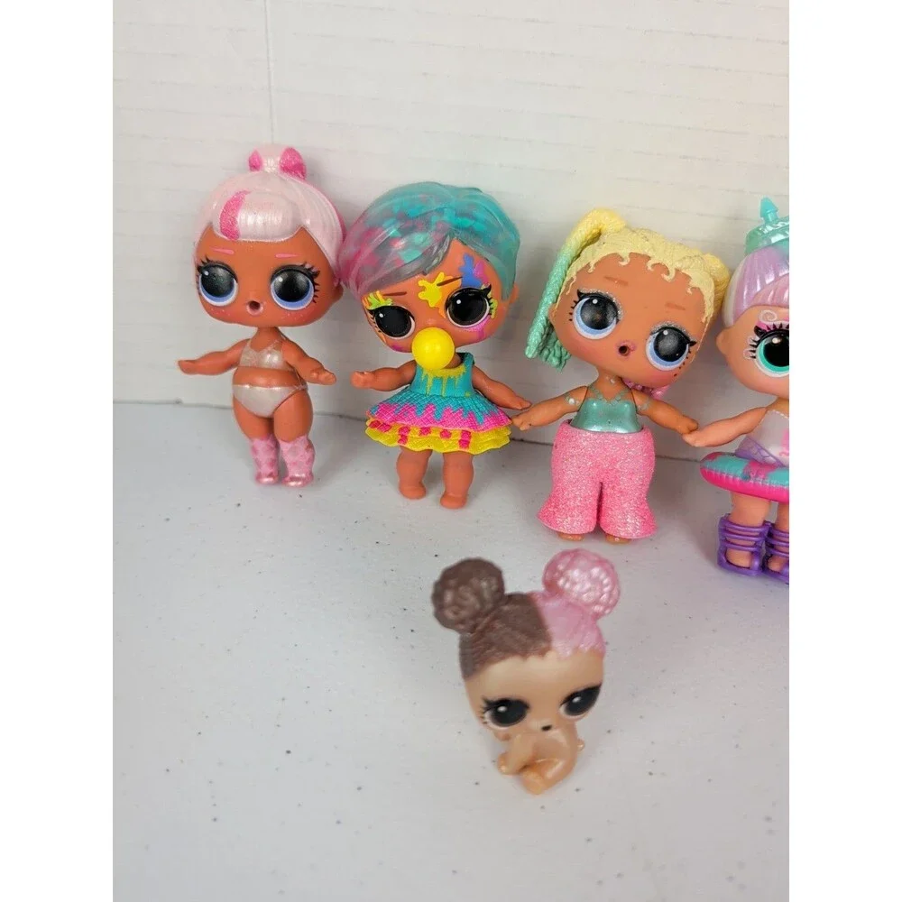 Lot of 8 LOL Surprise Dolls And Pet